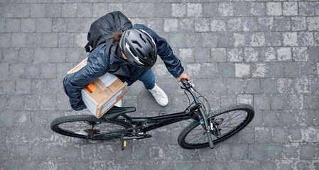 Delivery, package and man with a bicycle and box in the street for consumer order in the city. Transport, courier and male bike driver with stock with eco friendly transportation in the road in town. - obrazy, fototapety, plakaty
