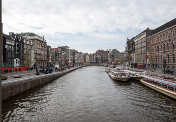  Traditional historic Dutch gable houses beside canal in Amsterdam The Netherlands