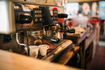 Fototapeta na wymiar Modern espresso machine in a cafe closeup