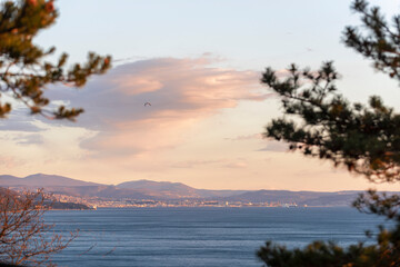 View from Rilke trail to Trieste gulf at sunset, picturesque cloud