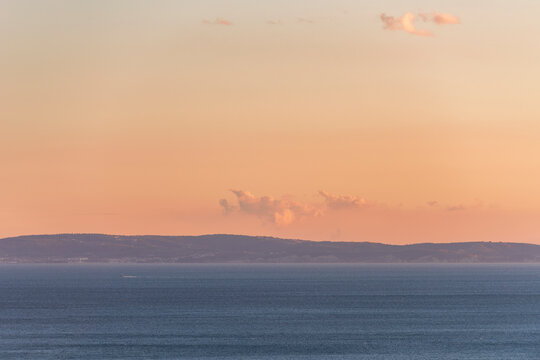 View from Rilke trail to distant hills at sunset
