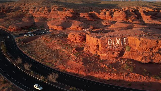 Aerial View of Dixie Rock, Landmark and Viewpoint Above St. George Utah USA at Sunset, Drone Shot