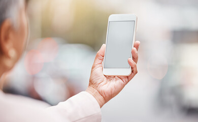 Businesswoman, hands and mockup phone in city for data management, gps app and review analytics...