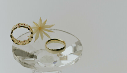 gold ring on glass, jewelry concept