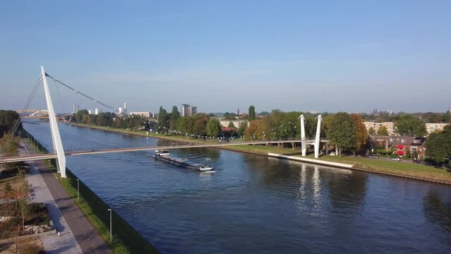 Cargo Ship Sailing Under Dafne Schippers Bridge In Utrecht, Netherlands
