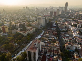 Fototapeta na wymiar Beautiful aerial view of the capital of Mexico city of Mexico City at sunset.