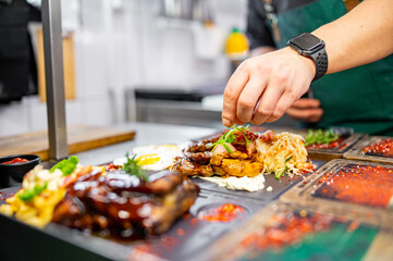 Professional chef cooking food in the kitchen restaurant