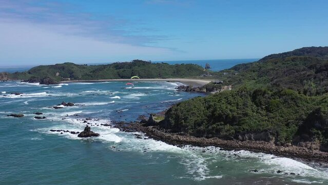 Paramotor fly in Patagonia, over the sea, using parachute and propeller motor