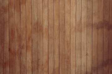 Vertical stained brown wooden planks texture background
