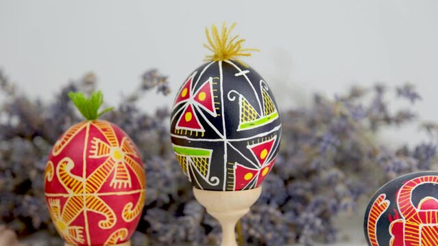 Pysanky are raw eggs painted with beeswax and paints that are given to each other for Easter dip a steel pen into hot wax on a raw cold egg to draw patterns Pen for painting Easter eggs with wax
