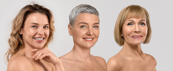 Middle aged and elderly ladies posing half-naked on studio background