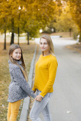 Fototapeta premium two women in autumn park