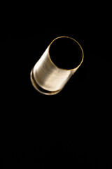 Pistol bullet casings isolated on black background