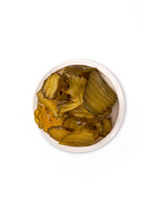 Pickled cucumbers in a small bowl