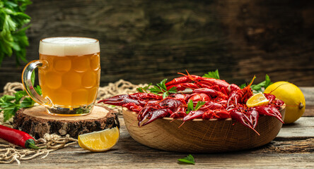 crayfish beer with lemon on a wooden background. Beer brewery concept. Snack for beer