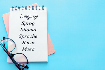 concept of international mother language day with place for text on blue background