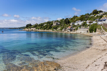 A beautiful summer day at Tavern beach at St. Mawes on the Roseland peninsular in Cornwall.