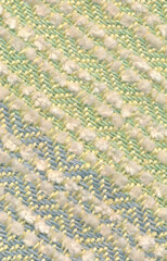 Close-up of handwoven piece of twill fabric, woven with linen and cotton yarn.