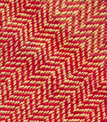 Close-up of handwoven piece of twill fabric, woven with linen and cotton yarn.