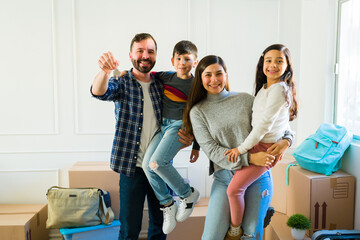 Cheerful family happy with their new home