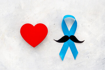 November prostate cancer awareness ribbon with a paper mustache