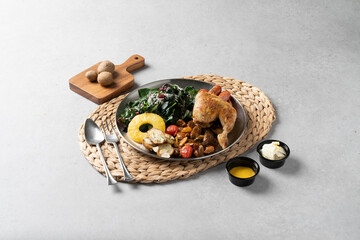 Korean food dish A plate of grilled chicken legs and vegetables