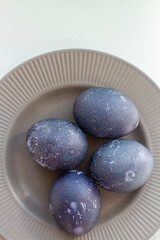 easter eggs on a gray plate