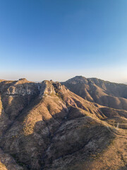 A beautiful aerial view of the endless mountains around the Mexican city of Guanajuato at sunset.