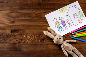 Child picture of family painted with colored pencils