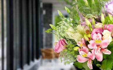 Fresh spring flowers bouquet on light background
