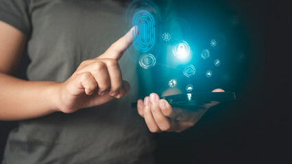 finger scanning with virtual screen on smartphone digital processing of biometric identification fingerprint scanner. concept of surveillance and security scanning of digital programs.