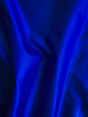 Blue satin background.