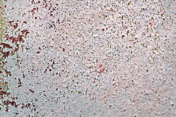 Old metal surfaces covered with rust and paint residue. Rust patterns as base and background.
