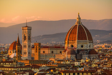 Fototapeta na wymiar The Florence Cathedral - Santa Maria del Fiore in an orange sunset.
