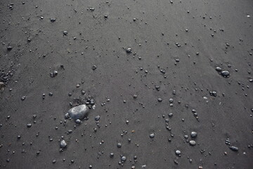 Stones on a black volcano beach on Canary Islands