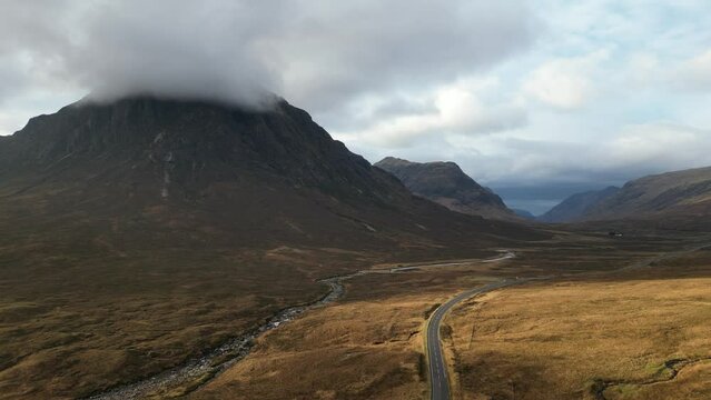 Glen Coe aerial with sun beams and low-lying cloud