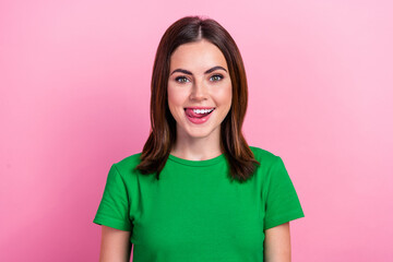 Photo of funny funky girl wear green crop top smiling licking lips isolated pink color background