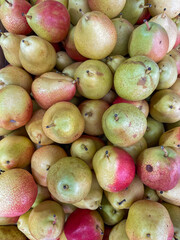 lots of ripe pears fruit food vitamins healthy nutrition as background