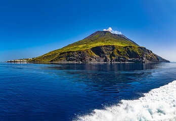 The vulcano island Stromboli in the blue sea north side