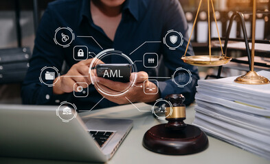 AML Anti Money Laundering Financial Bank Business Concept. judge in a courtroom using laptop and...