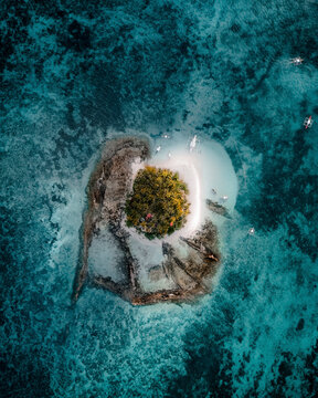 Aerial view of a many Catamaran boats along Coron Island coastline, Bayan ng Coron, Palawan, Philippines.