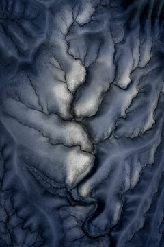 Aerial view of a cluster of sandstone details in Utah desert valley plateau at night, Hanksville, United States.
