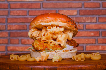 mac and cheese chicken burger seasoned with honey mustard sauce