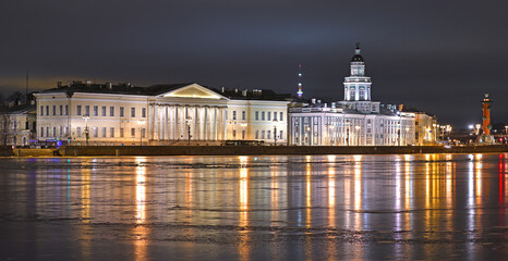 Winter night landscape. Kunstkamera (Museum of Anthropology and Ethnography) and Building of Imperial Academy of Sciences in Saint Petersburg on Universitetskaya Embankment