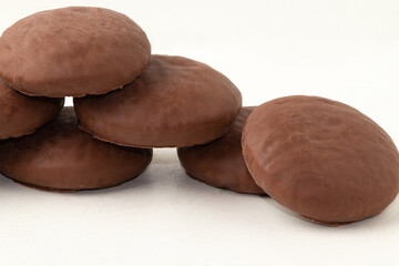 Pile of honey cookies (pão de mel) isolated on white background.