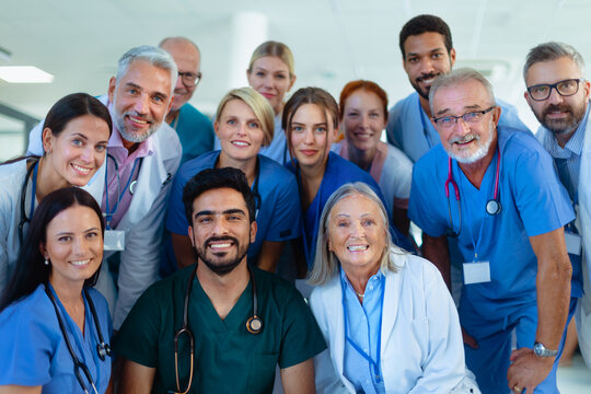 Portrait of happy doctors, nurses and other medical staff in hospital.