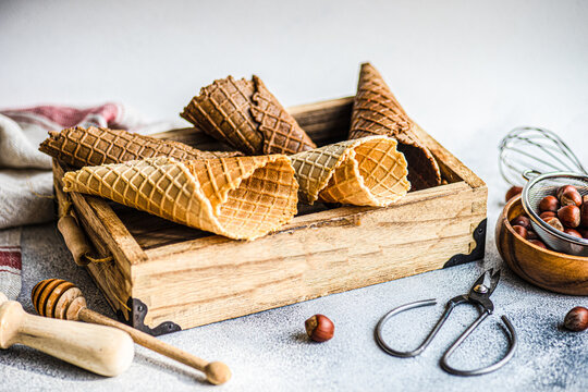 Wooden box with empty waffle cones