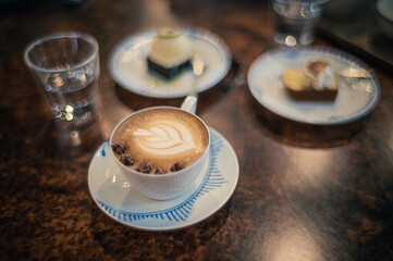 a cup of coffee with beautiful latte art