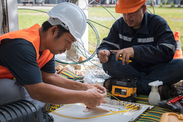 Engineer or technician are install fiber optic cable lines for maintenance..