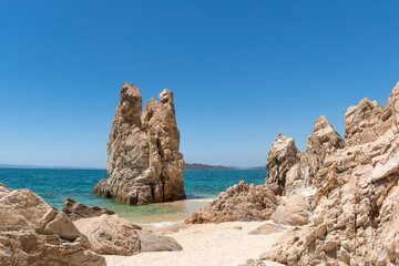 Paradise hidden sandy sea beach and unique bizarre rock formations on Trimi beach of Athos...